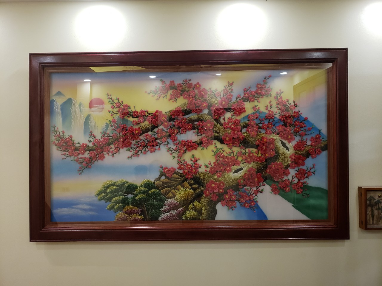 Tranh đá quý hoa đào thế rồng ngậm ngọc